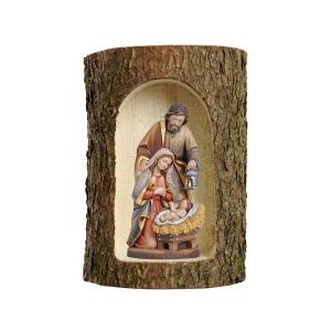 Tronco di albero con presepio