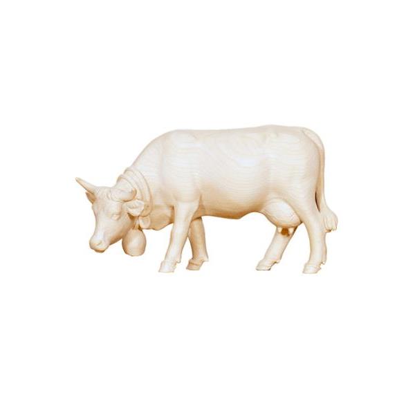 Cow grazing - natural wood