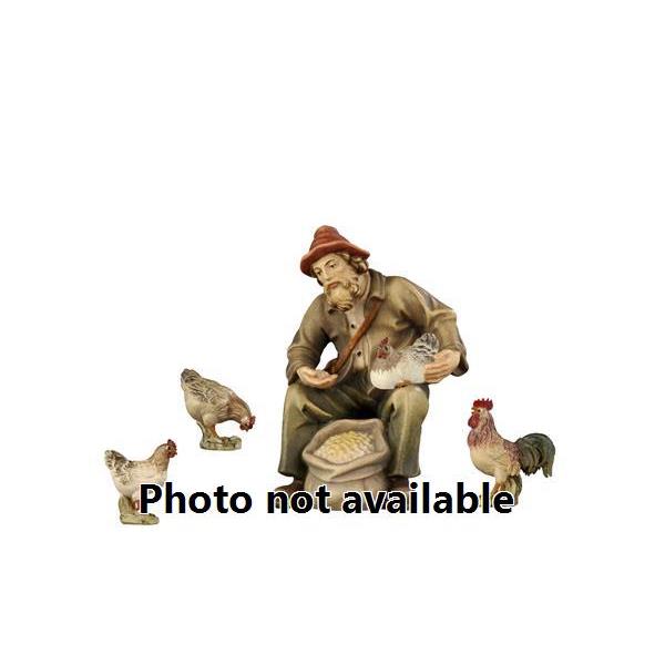 RA Shepherd sitting with hen - 